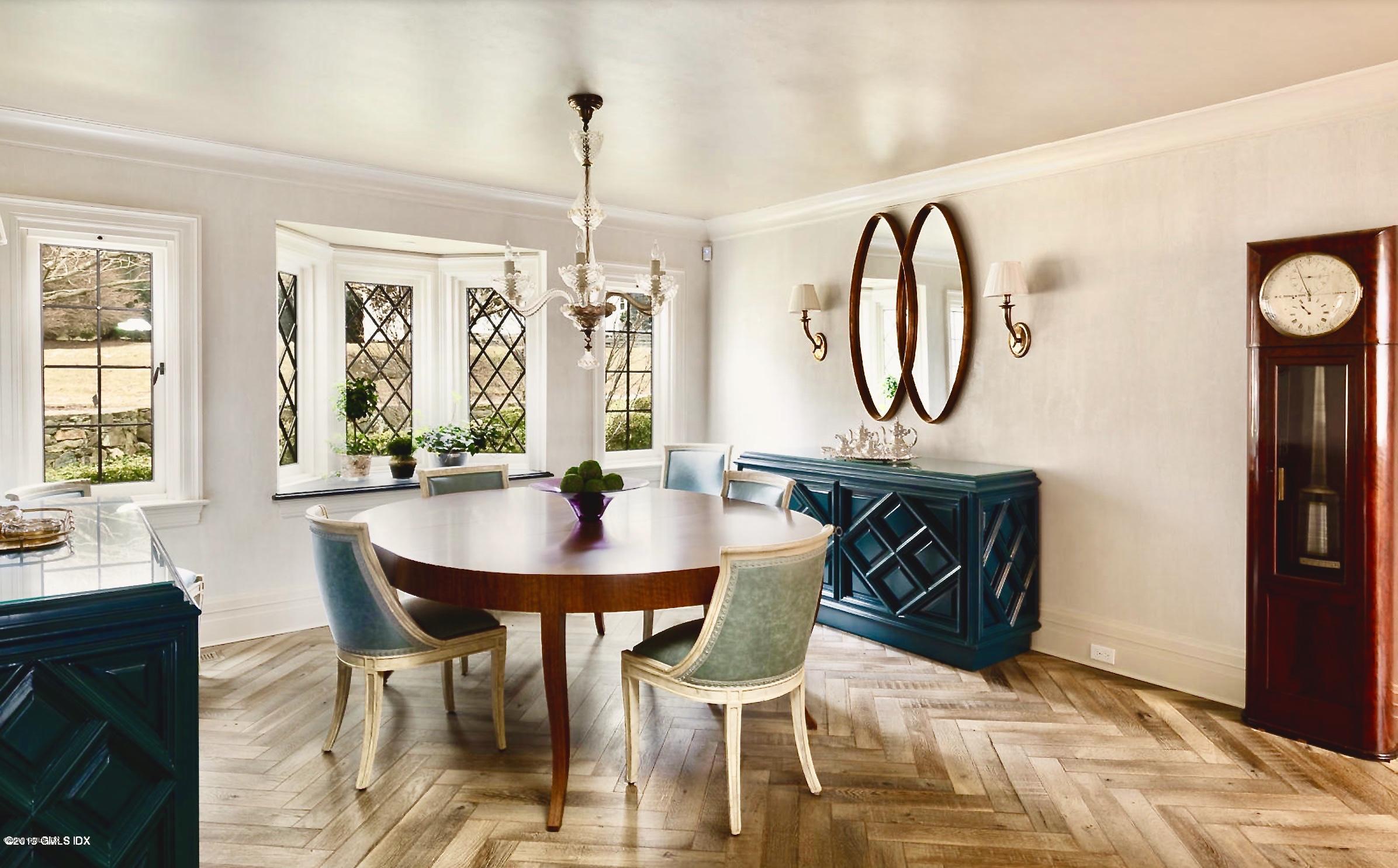 4 Cedar Hill Greenwich, CT 06830 - Photo 6 of 28 a view of a a dining room with furniture window and wooden floor