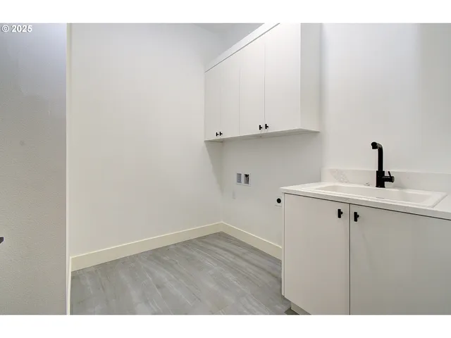 a white bath tub sitting in a bathroom