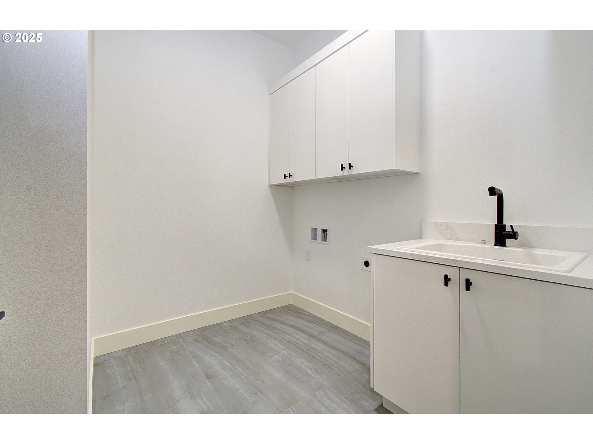 2010 Northeast 159th Street Ridgefield, WA 98642 - Photo 29 of 42 a view of a kitchen with white cabinets