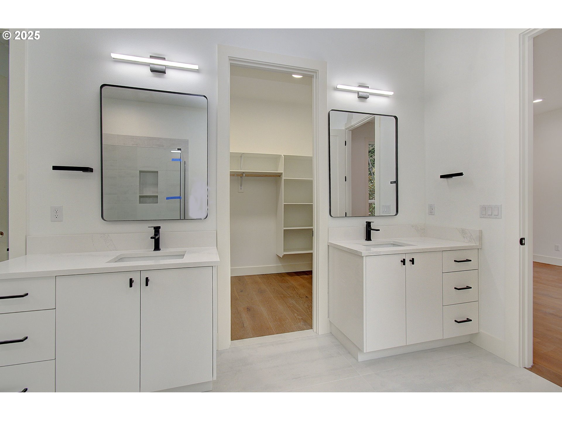 2010 Northeast 159th Street Ridgefield, WA 98642 - Photo 32 of 42 a bathroom with a sink double vanity and a mirror