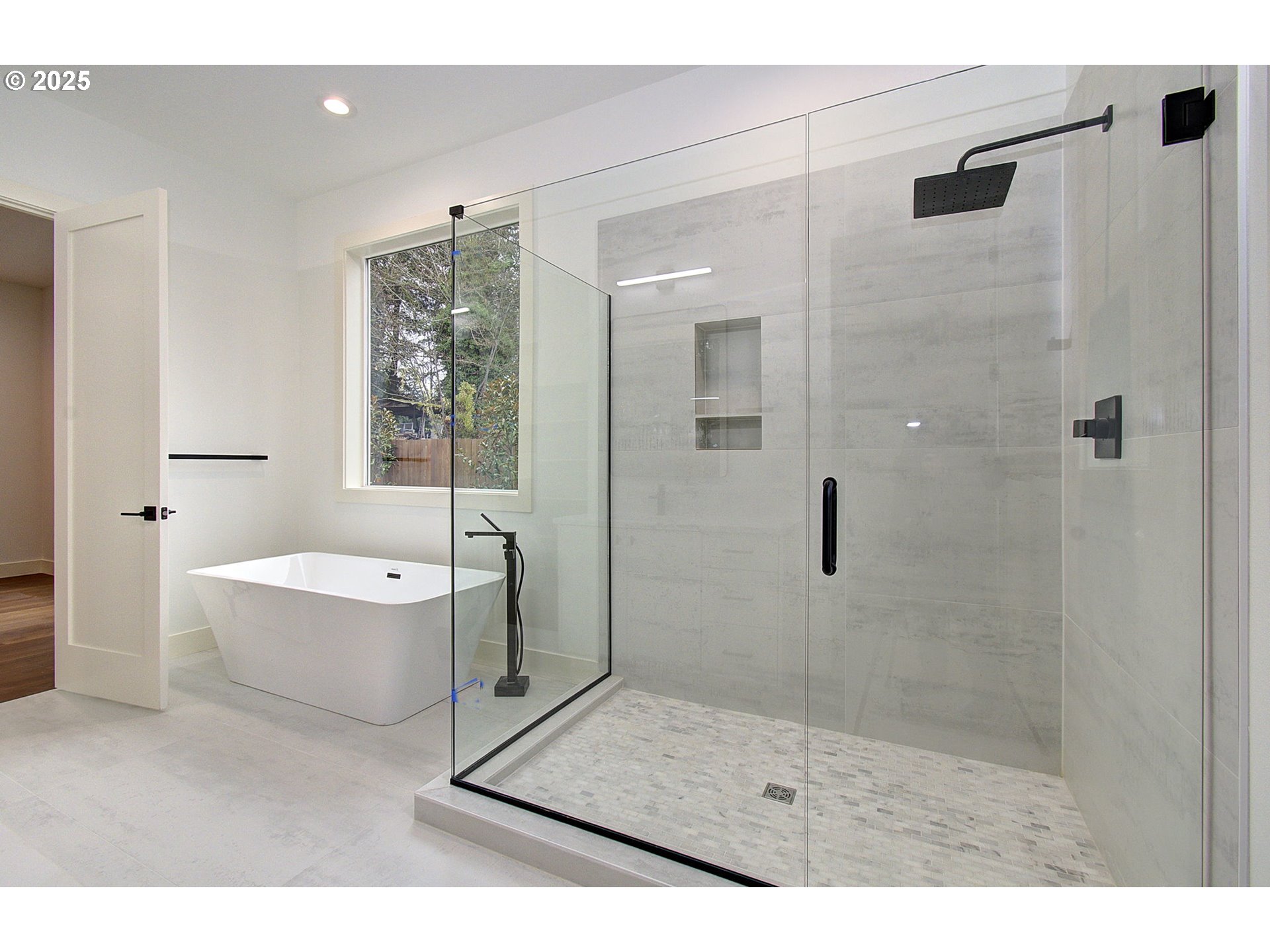 2010 Northeast 159th Street Ridgefield, WA 98642 - Photo 41 of 42 a bathroom with a bathtub and shower