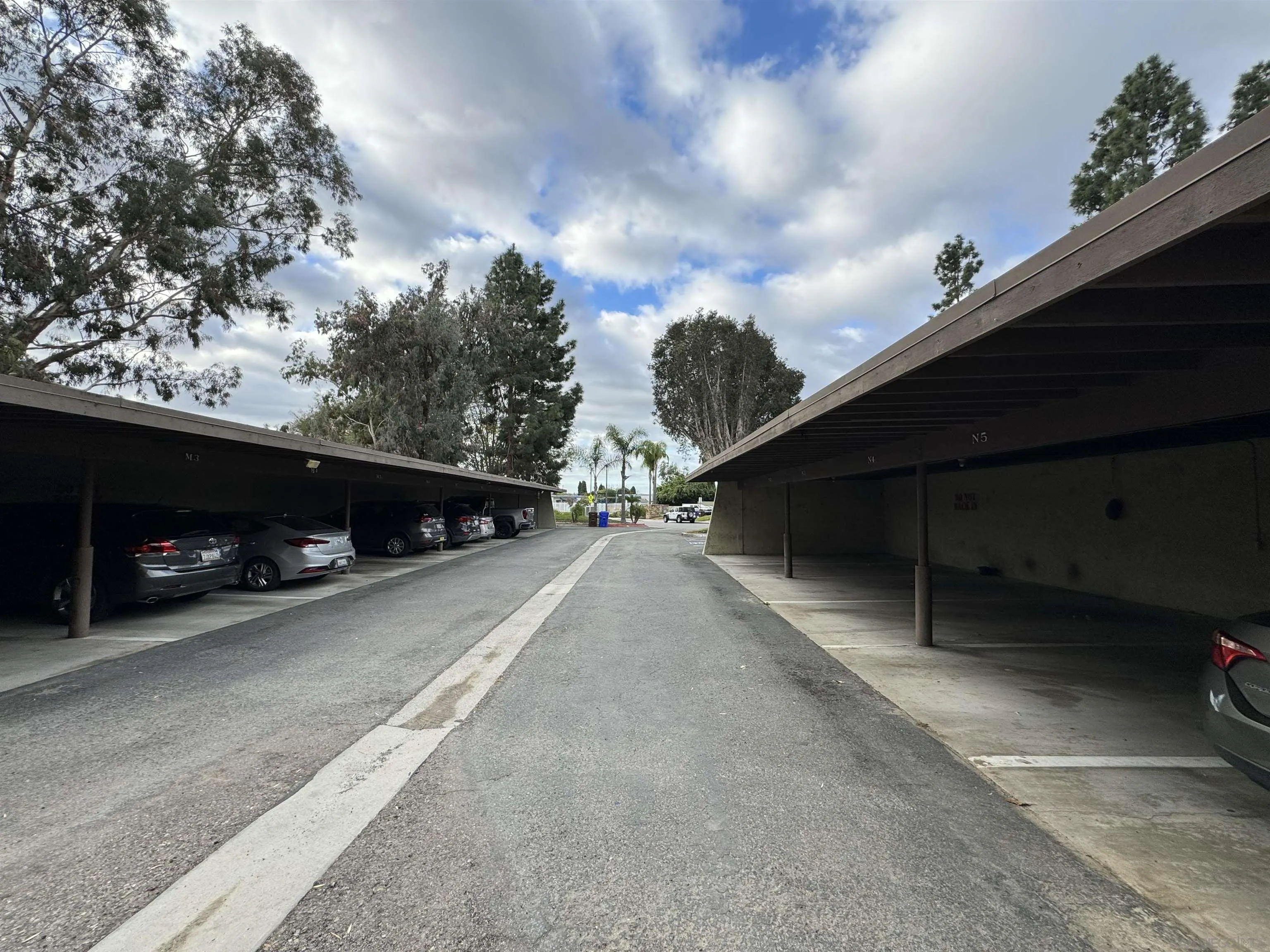 506 Calle Montecito, Unit 40 Oceanside, CA 92057 - Photo 11 of 19 a view of car parked in parking lot