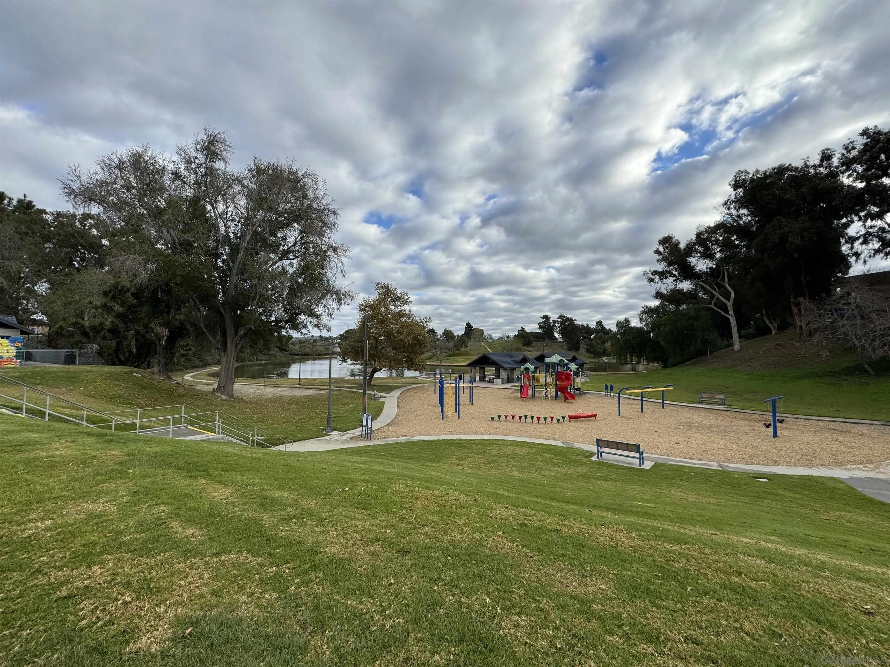 506 Calle Montecito, Unit 40 Oceanside, CA 92057 - Photo 15 of 19 a view of a garden with lawn chairs