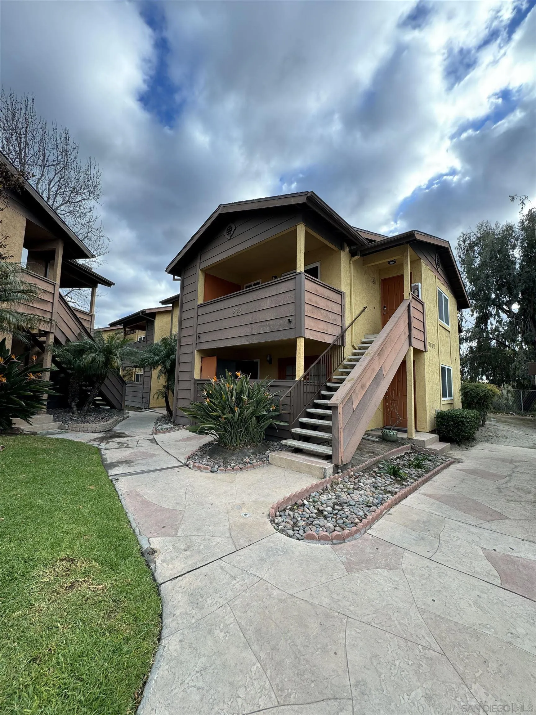 506 Calle Montecito, Unit 40 Oceanside, CA 92057 - Photo 2 of 19 a front view of house with a garden