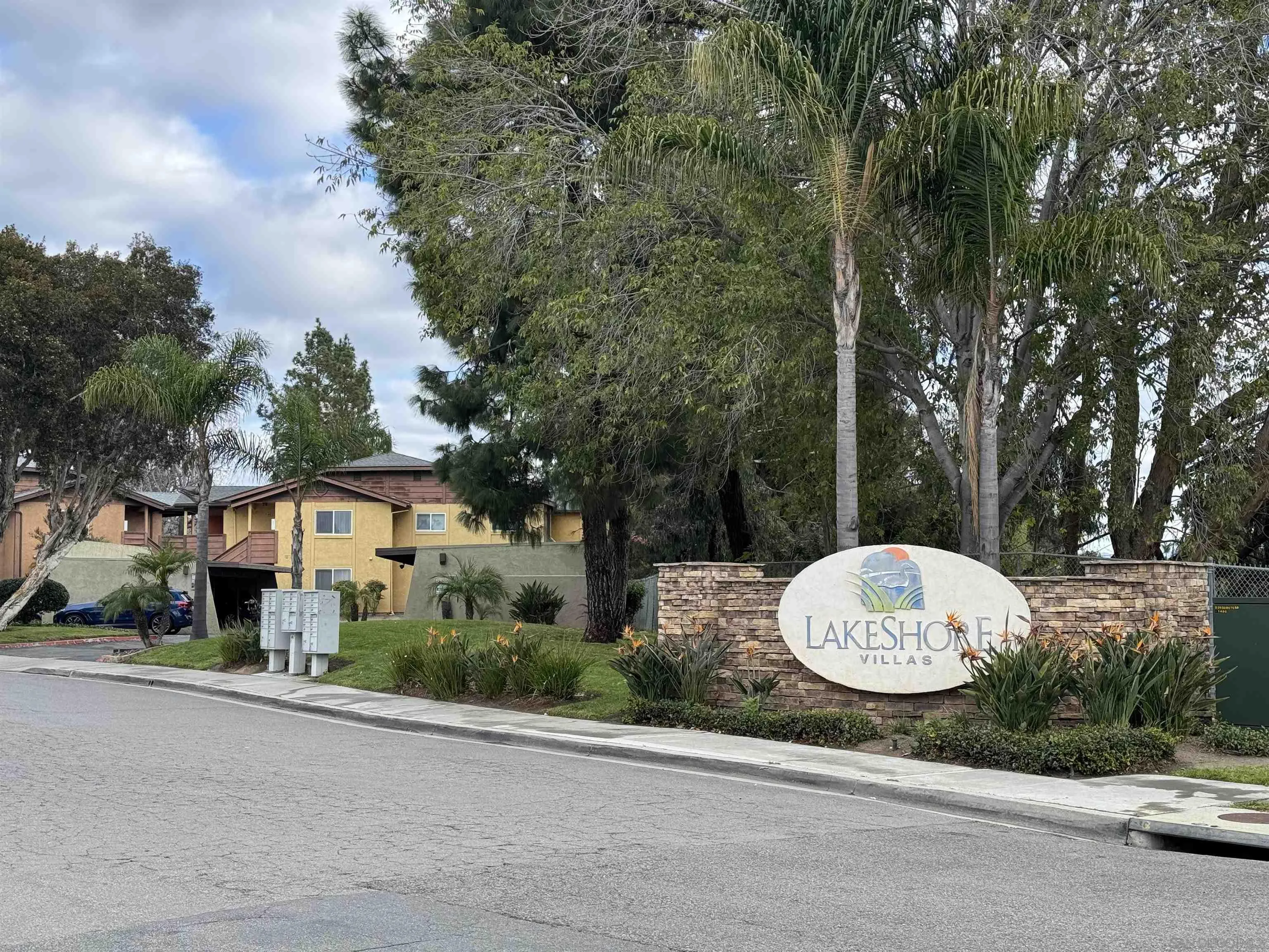 506 Calle Montecito, Unit 40 Oceanside, CA 92057 - Photo 10 of 19 a view of a white house with a table and chairs