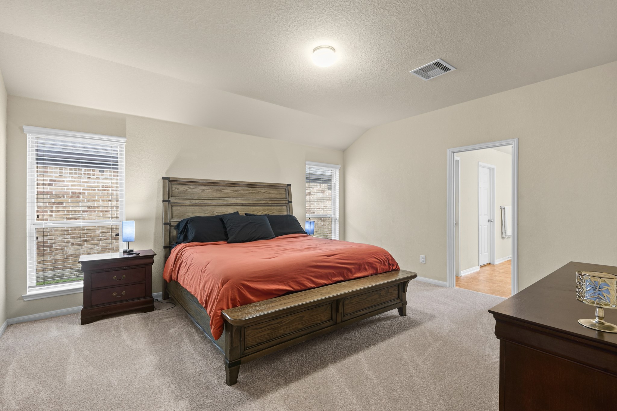 5211 Cayenne Lane Baytown, TX 77521 - Photo 9 of 19 The primary bedroom features brand new carpet, neutral paint and plenty of space!