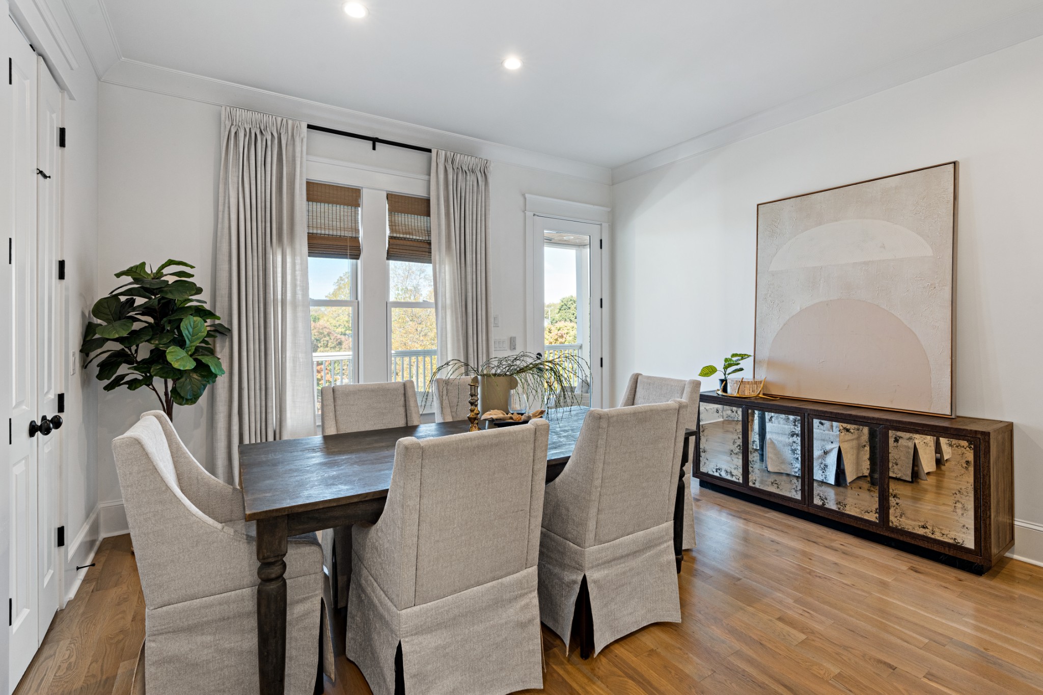 110 Lindsley Park Drive Nashville, TN 37206 - Photo 11 of 32 a view of a dining room with furniture window and wooden floor