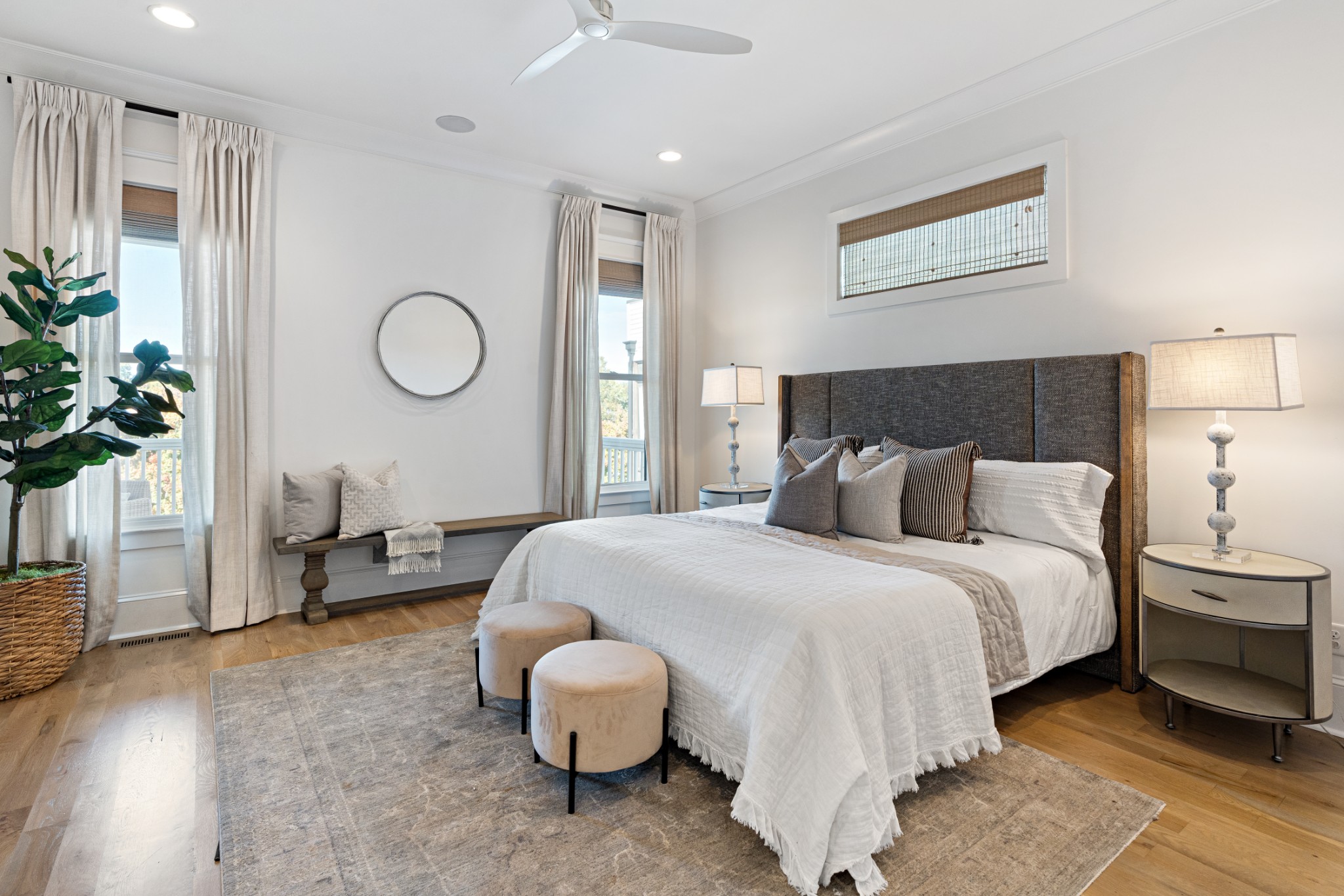 110 Lindsley Park Drive Nashville, TN 37206 - Photo 12 of 32 a bed room with a bed and a potted plant