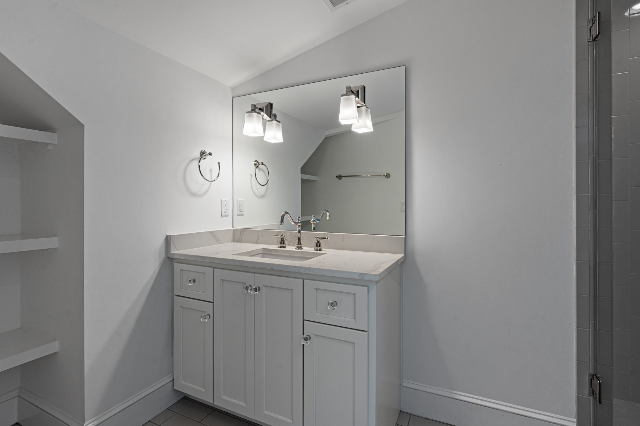 110 Lindsley Park Drive Nashville, TN 37206 - Photo 21 of 32 a bathroom with a sink and a mirror