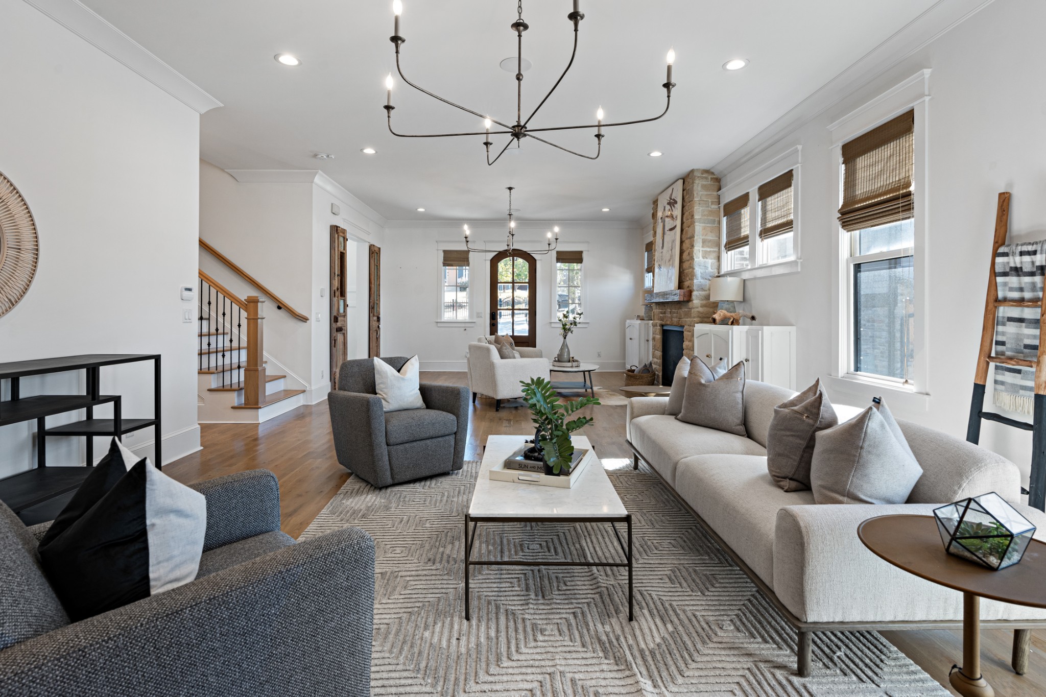 110 Lindsley Park Drive Nashville, TN 37206 - Photo 7 of 32 a living room with furniture and a chandelier