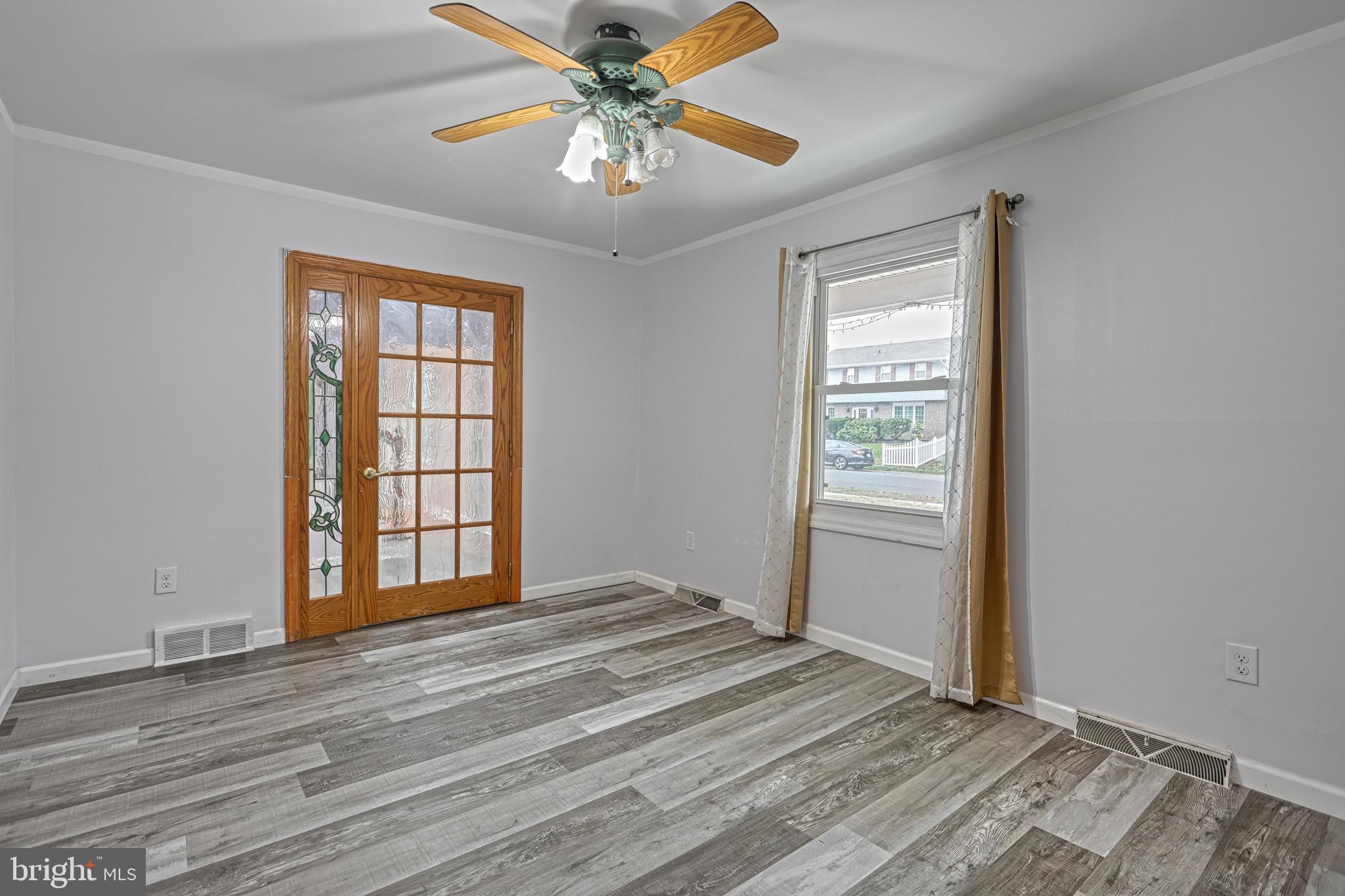 1373 Quail Hollow Road Harrisburg, PA 17112 - Photo 11 of 68 wooden floor in an empty room with a window