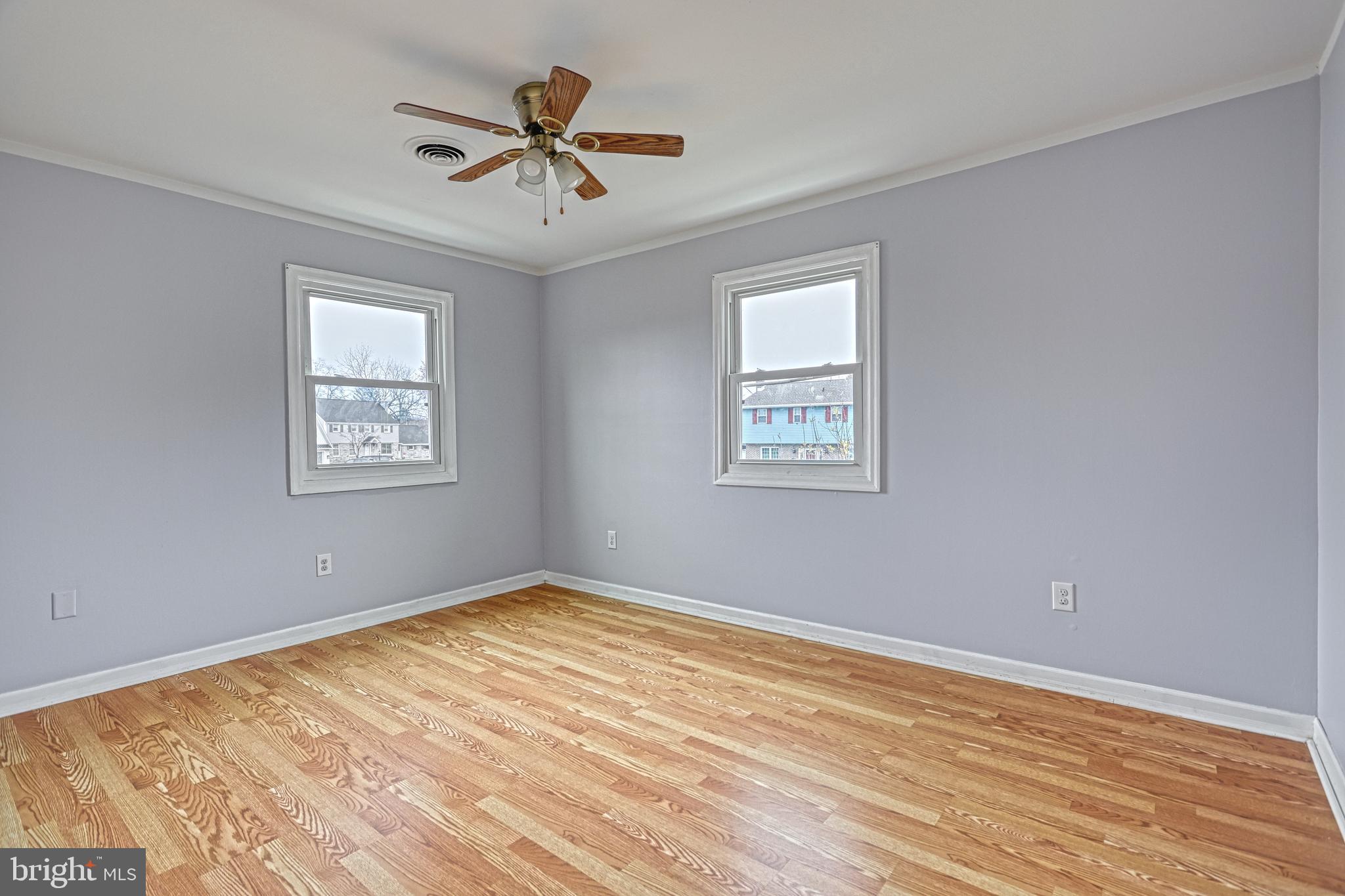 1373 Quail Hollow Road Harrisburg, PA 17112 - Photo 30 of 68 a view of empty room with wooden floor and fan