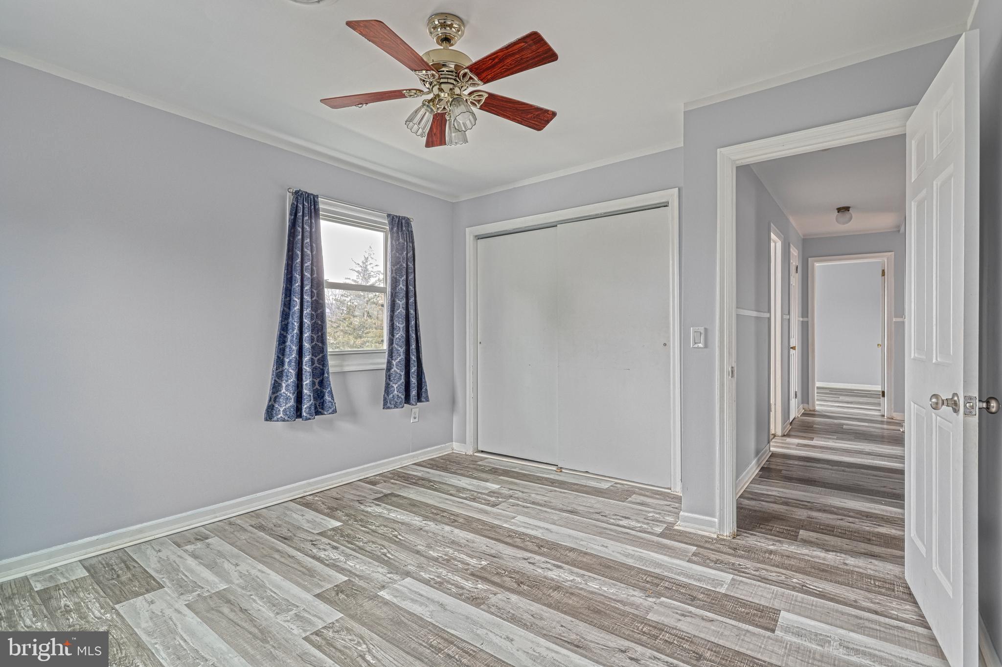 1373 Quail Hollow Road Harrisburg, PA 17112 - Photo 40 of 68 wooden floor in an empty room with a window