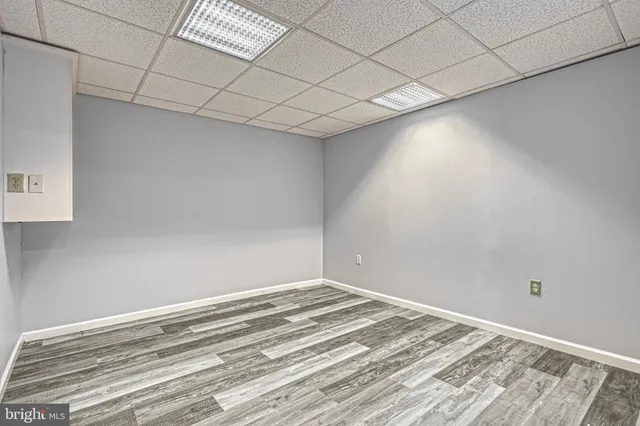 a view of a two chairs on the roof deck