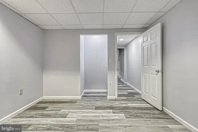 a balcony with wooden floor