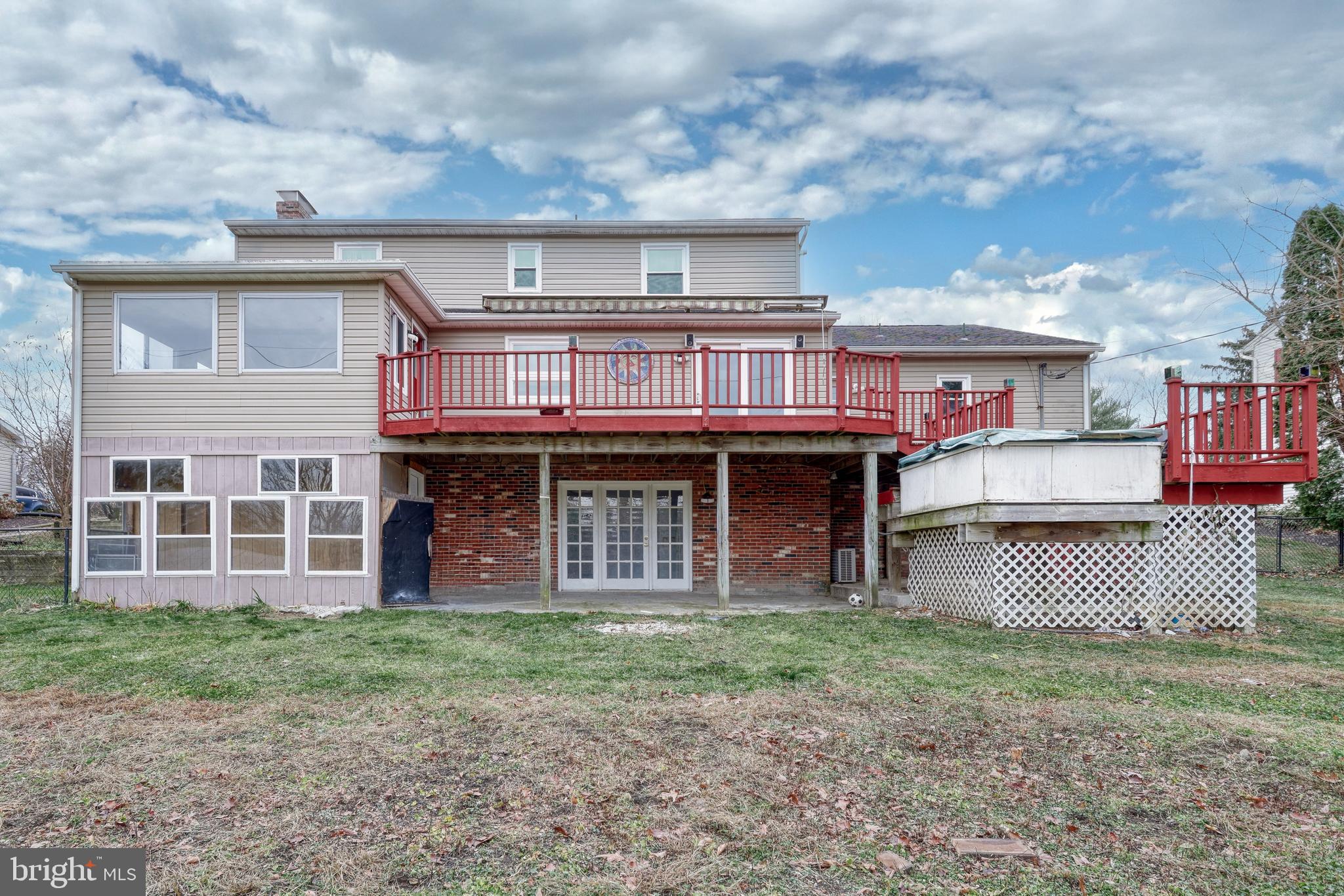 1373 Quail Hollow Road Harrisburg, PA 17112 - Photo 5 of 68 a front view of a house with a garden