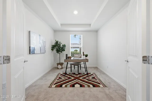a bathroom with a double vanity sink and mirror