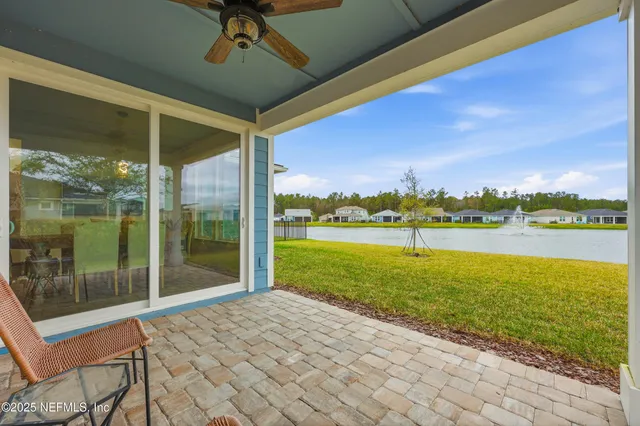 a kitchen with stainless steel appliances wooden cabinets and a stove top oven