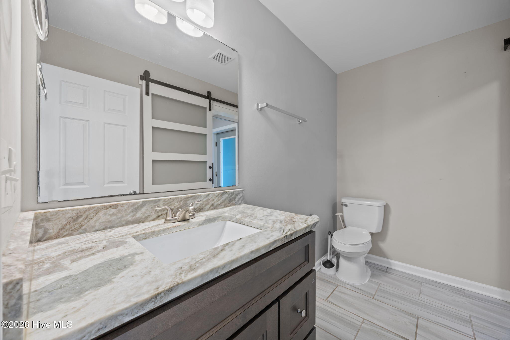 319 Blue Top Road Jacksonville, NC 28540 - Photo 17 of 62 First floor half bath attached to laundry area