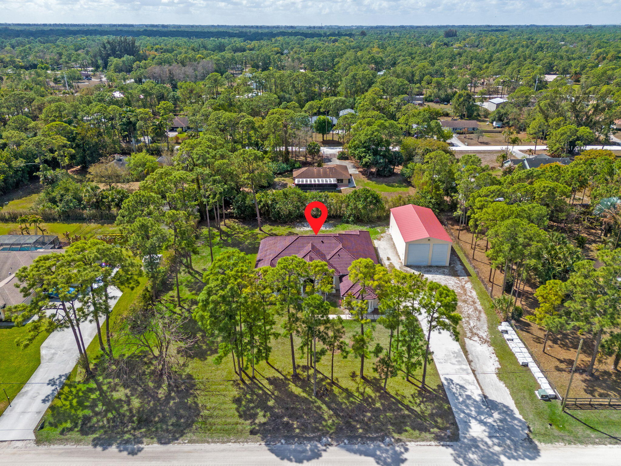 16596 82nd Road North The Acreage, FL 33470 - Photo 61 of 62 59-web-or-mls-DJI_20260309114920_0992_D-