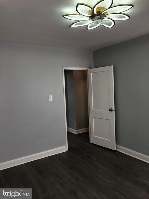 2802 Windsor Avenue Baltimore, MD 21216 - Photo 22 of 37 a view of an empty room with wooden floor