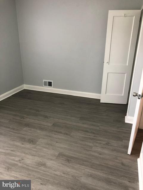 2802 Windsor Avenue Baltimore, MD 21216 - Photo 26 of 37 a view of wooden floor in an empty room