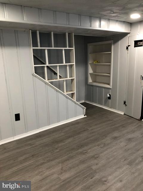 2802 Windsor Avenue Baltimore, MD 21216 - Photo 28 of 37 a view of an empty room with wooden floor and cabinet