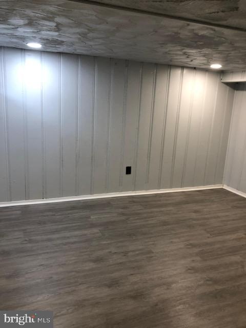 2802 Windsor Avenue Baltimore, MD 21216 - Photo 29 of 37 a view of an empty room with wooden floor