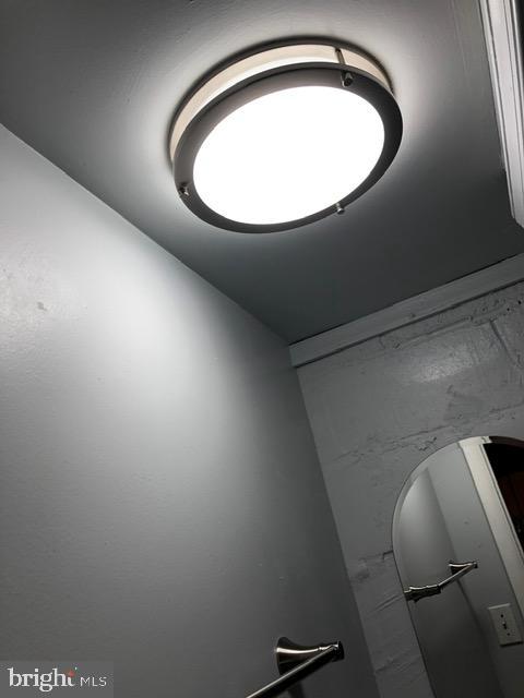 2802 Windsor Avenue Baltimore, MD 21216 - Photo 33 of 37 a view of staircase with wooden floor