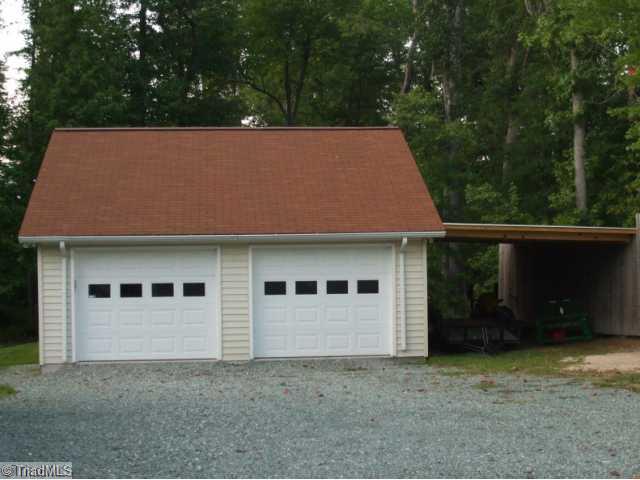 2835 Timber Ridge Lake Road Liberty, NC 27298 - Photo 2 of 7 Other. Custom garage for handyman s dream work area