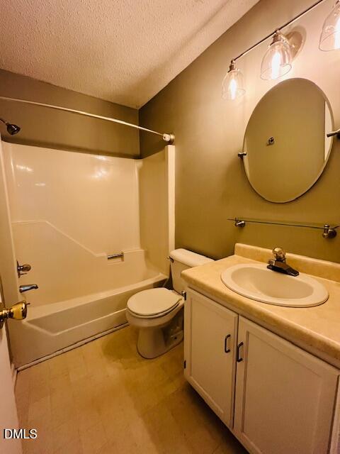 3315 Swansea Street Durham, NC 27707 - Photo 11 of 19 a bathroom with a sink mirror vanity and toilet