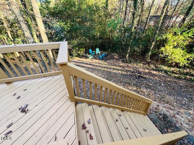 3315 Swansea Street Durham, NC 27707 - Photo 18 of 19 a view of balcony with wooden floor and fence