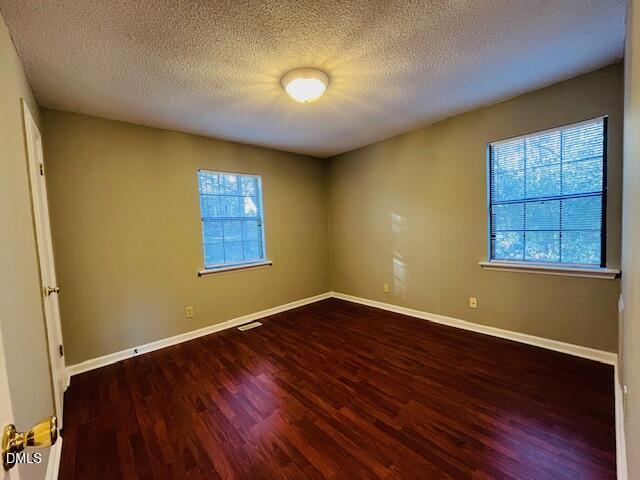 3315 Swansea Street Durham, NC 27707 - Photo 10 of 19 an empty room with windows