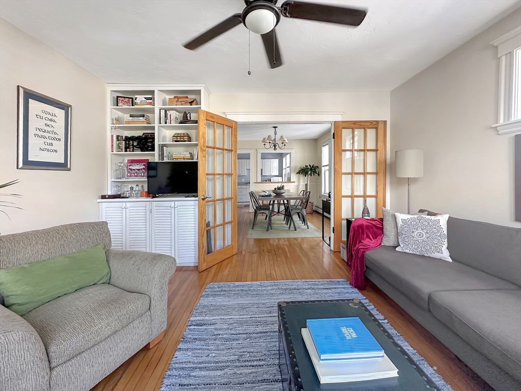 43 Boynton Street, Unit 3R Boston, MA 02130 - Photo 2 of 12 a living room with furniture and a wooden floor