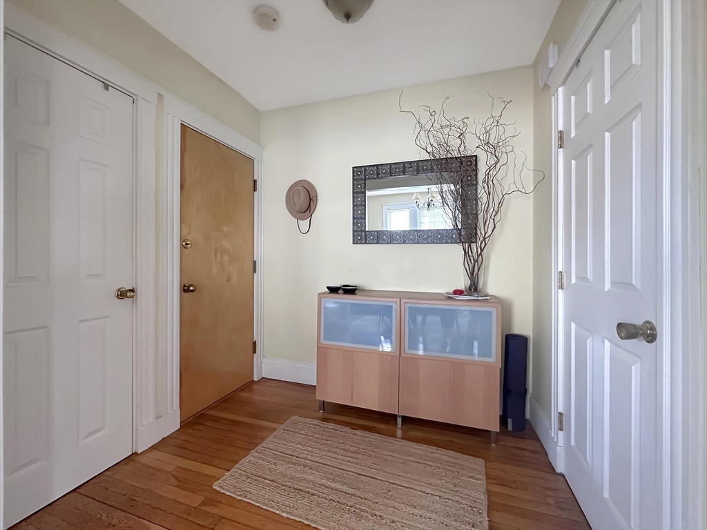 43 Boynton Street, Unit 3R Boston, MA 02130 - Photo 3 of 12 a view of a livingroom with wooden floor and furniture