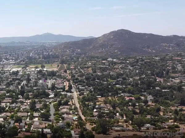 a view of city and mountain