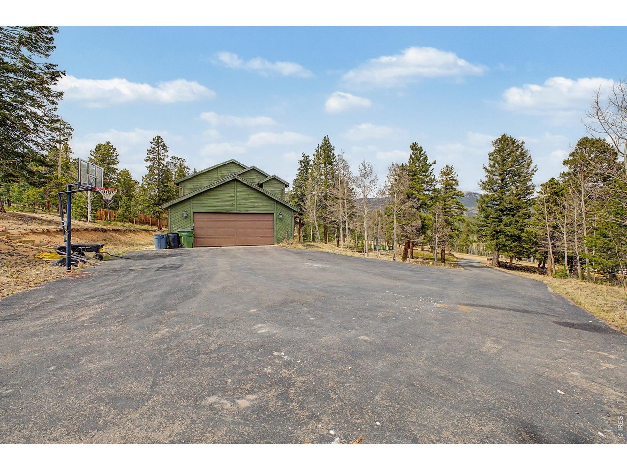 76 Highlands Drive Bailey, CO 80421 - Photo 34 of 49 a view of a house with a park