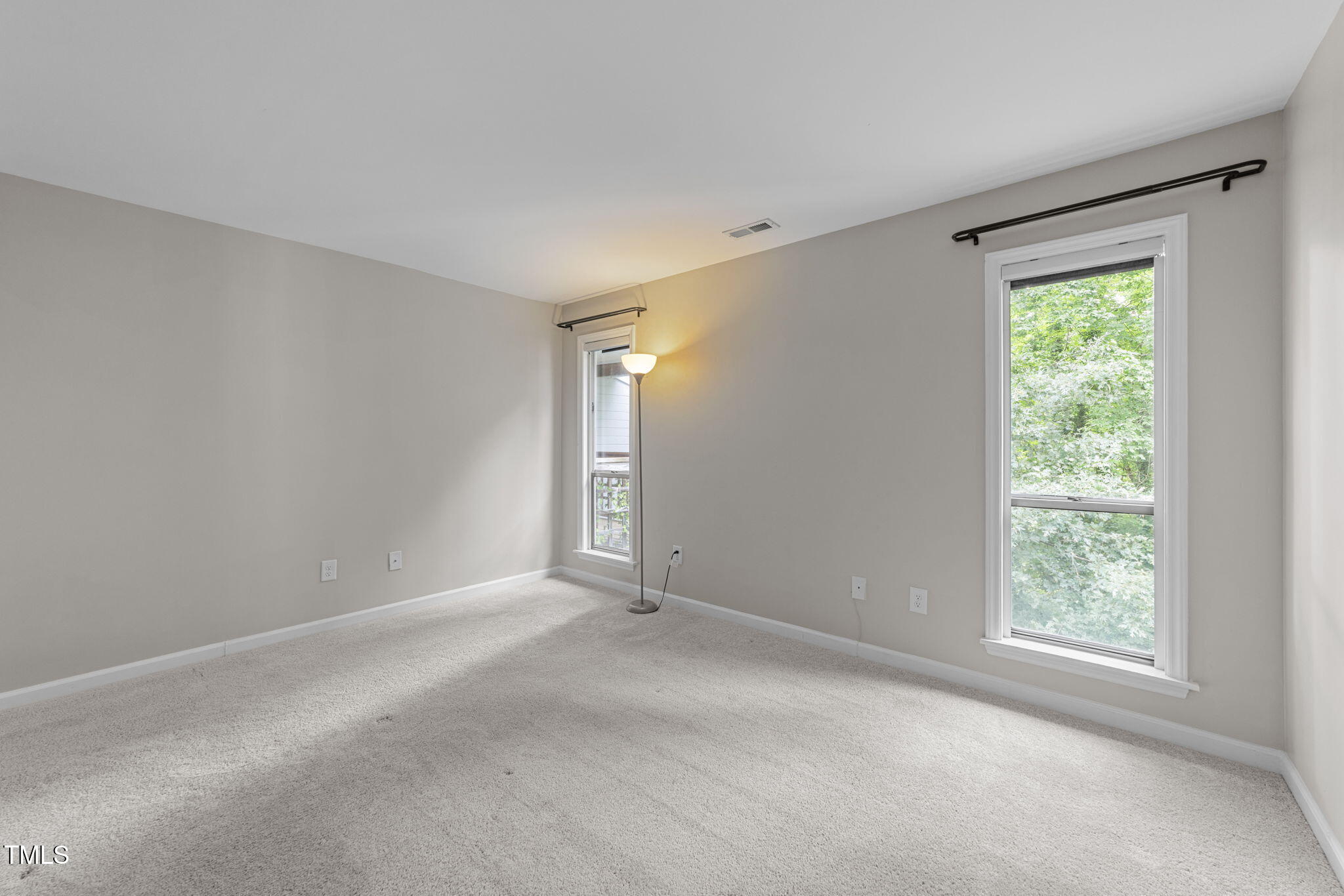 4601 Timbermill Court, Unit 303 Raleigh, NC 27612 - Photo 15 of 37 a view of an empty room with a window