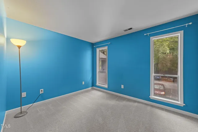 a bathroom with a sink toilet and mirror