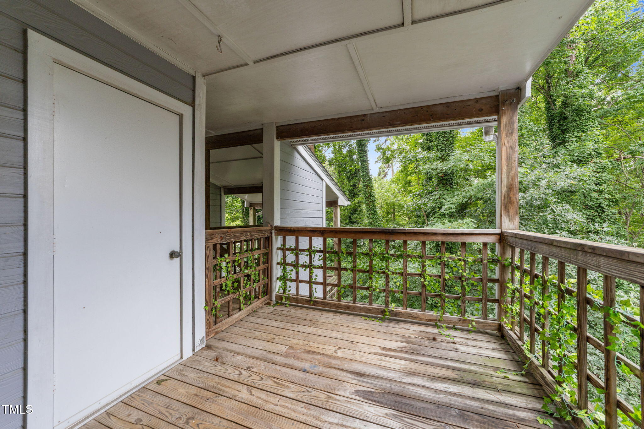 4601 Timbermill Court, Unit 303 Raleigh, NC 27612 - Photo 24 of 37 a view of a balcony with wooden floor