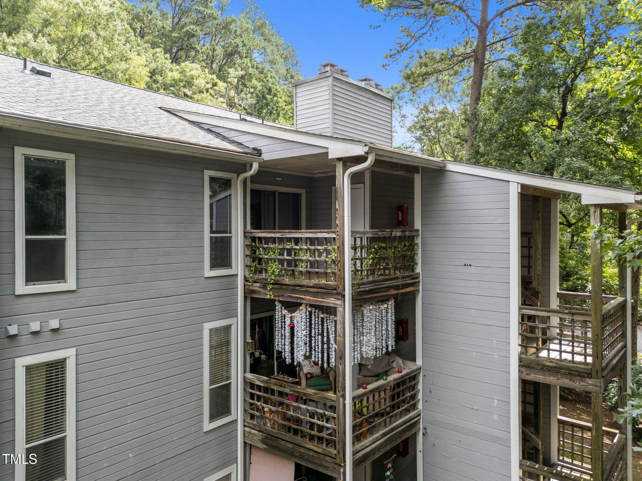 4601 Timbermill Court, Unit 303 Raleigh, NC 27612 - Photo 26 of 37 a front view of a house with a balcony