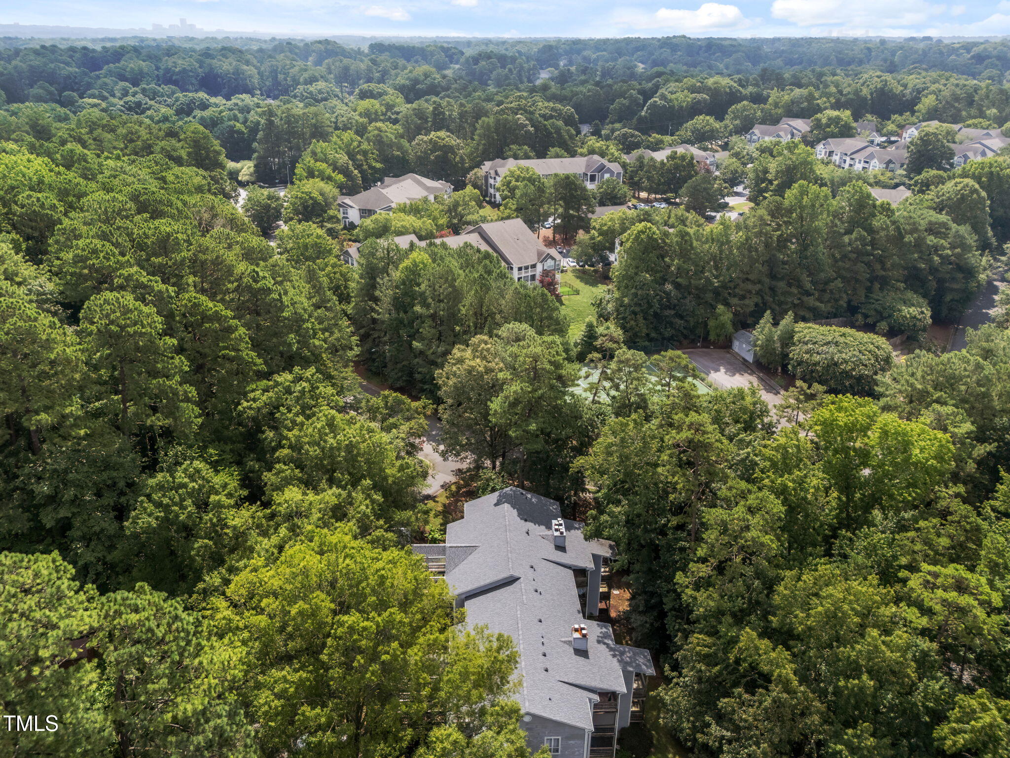 4601 Timbermill Court, Unit 303 Raleigh, NC 27612 - Photo 33 of 37 an aerial view of residential house with outdoor space