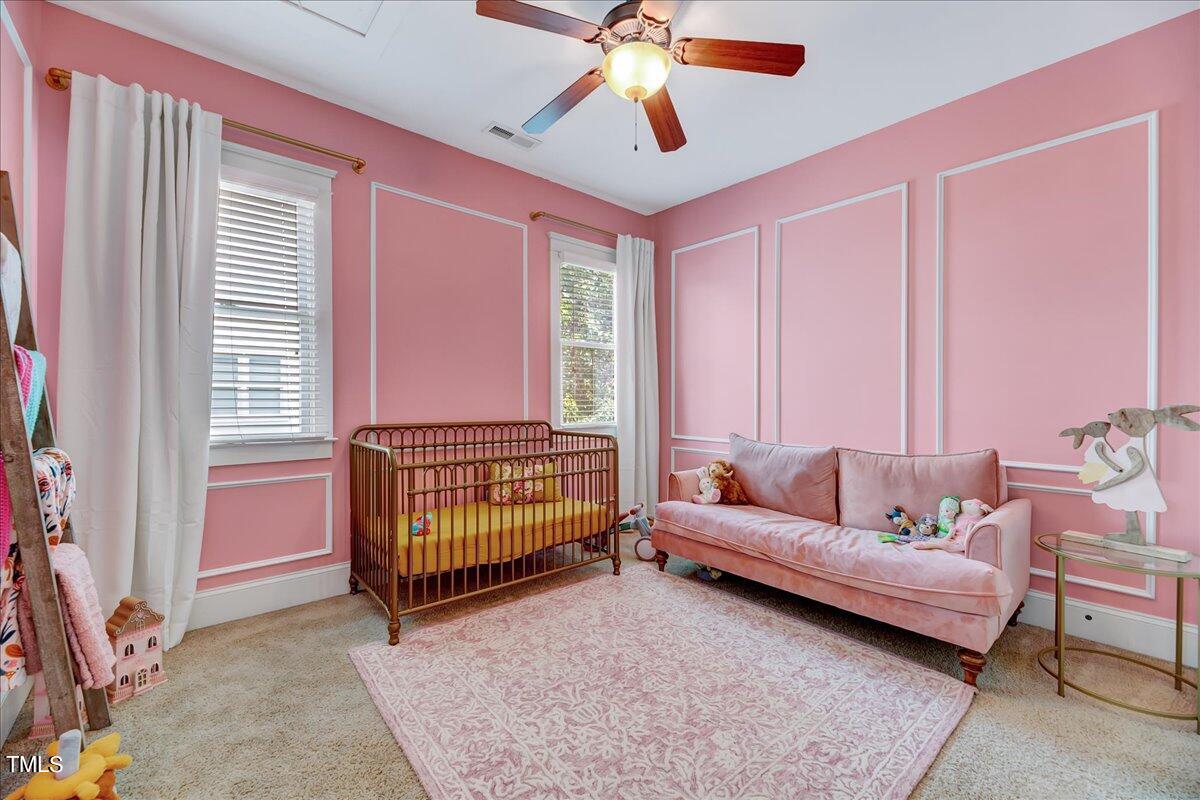 2901 Brighton Bluff Drive Apex, NC 27539 - Photo 20 of 35 a living room with furniture and a window