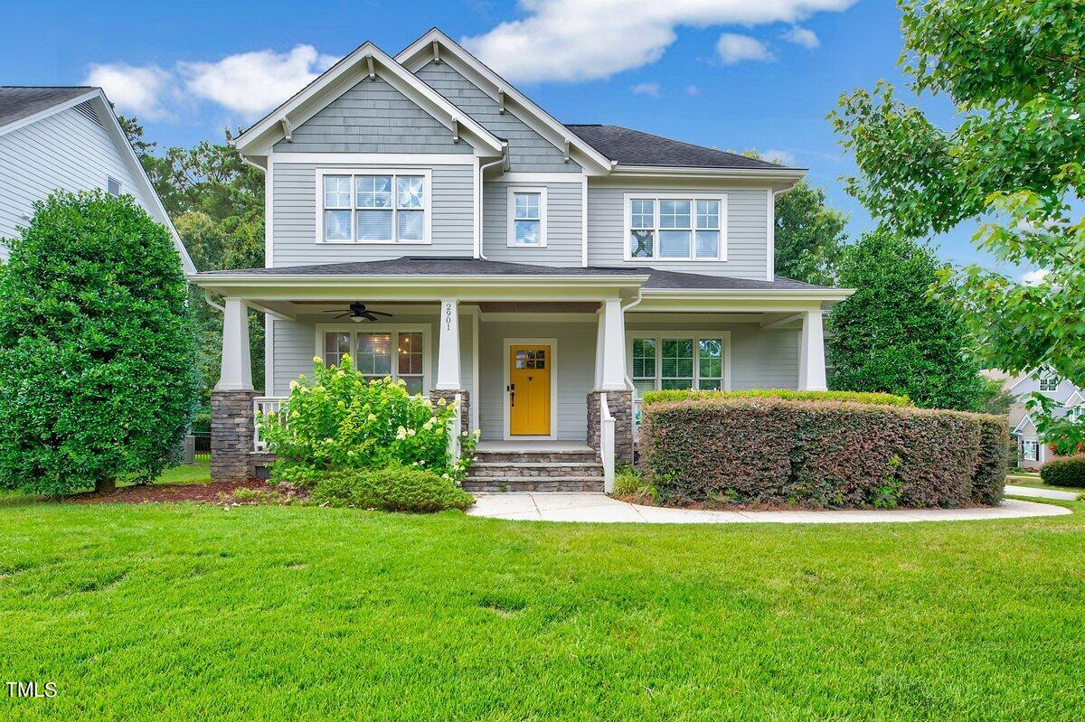 2901 Brighton Bluff Drive Apex, NC 27539 - Photo 2 of 35 a front view of a house with a yard