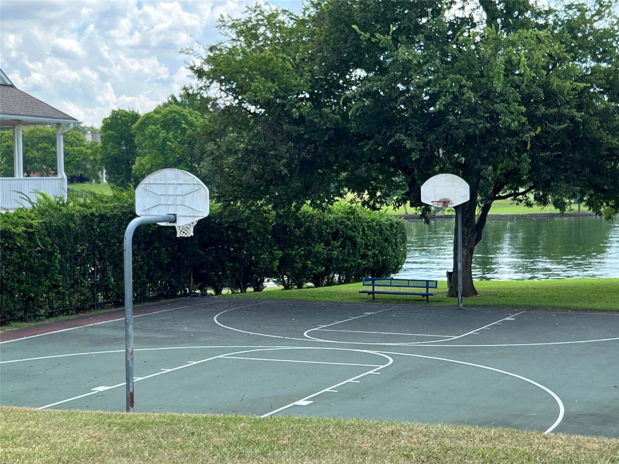 7041 Kingston Cove Lane Willis, TX 77318 - Photo 18 of 19 a view of a basket ball ground