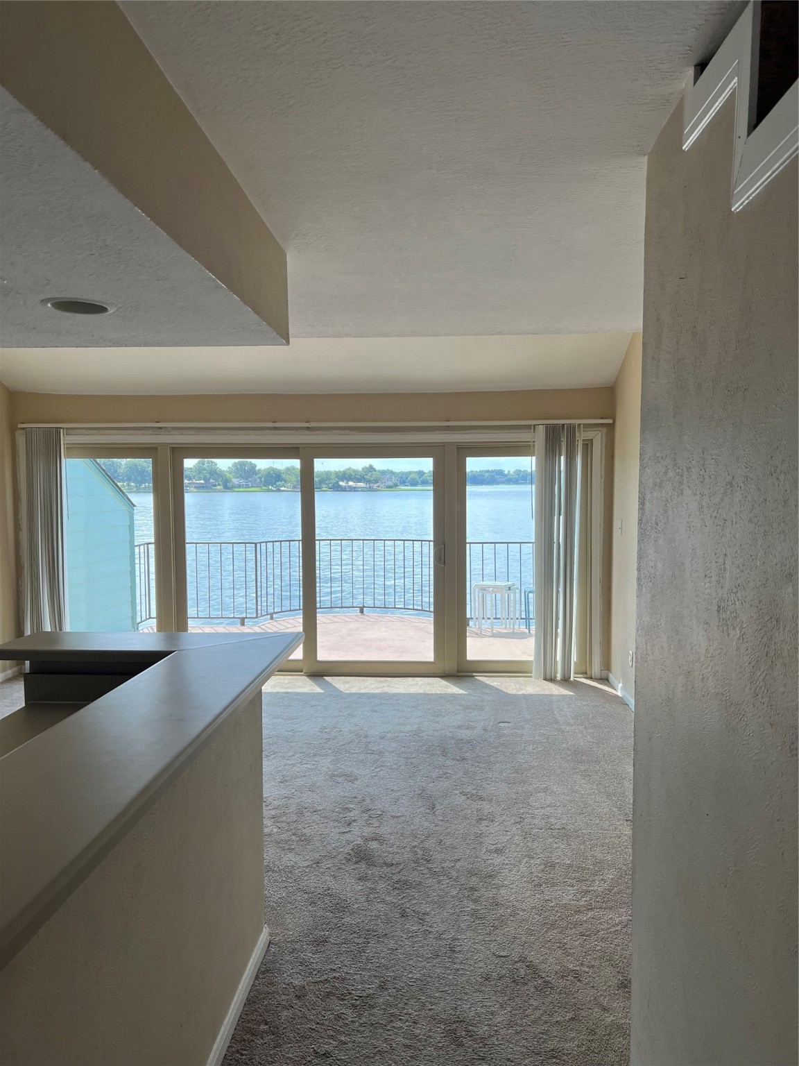 7041 Kingston Cove Lane Willis, TX 77318 - Photo 3 of 19 a view of an empty room with a window