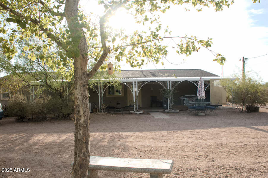 200 North Tomahawk Road Apache Junction, AZ 85119 - Photo 2 of 56 a view of a barn in the middle of a yard