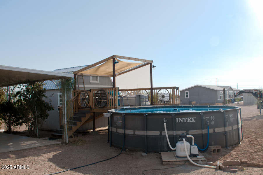 200 North Tomahawk Road Apache Junction, AZ 85119 - Photo 22 of 56 a view of a balcony with an outdoor space