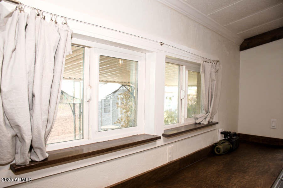 200 North Tomahawk Road Apache Junction, AZ 85119 - Photo 27 of 56 a view of a window in an empty room