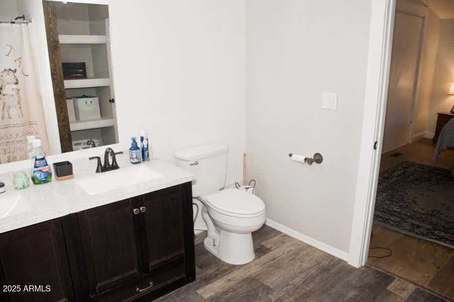 200 North Tomahawk Road Apache Junction, AZ 85119 - Photo 28 of 56 a bathroom with a sink and a toilet